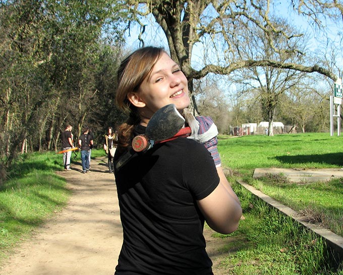 Student holding tool