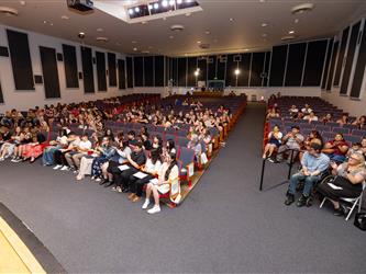 student receiving their certificate
