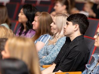 guests watching graduates 