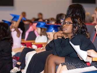 student watching in crowd 