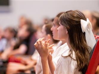 student clapping 