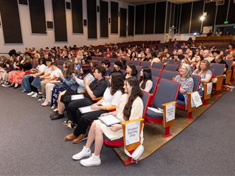 student receiving their certificate